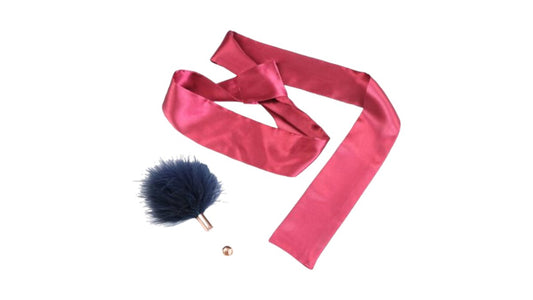 Blindfold and small feather rod for tickling and stimulation